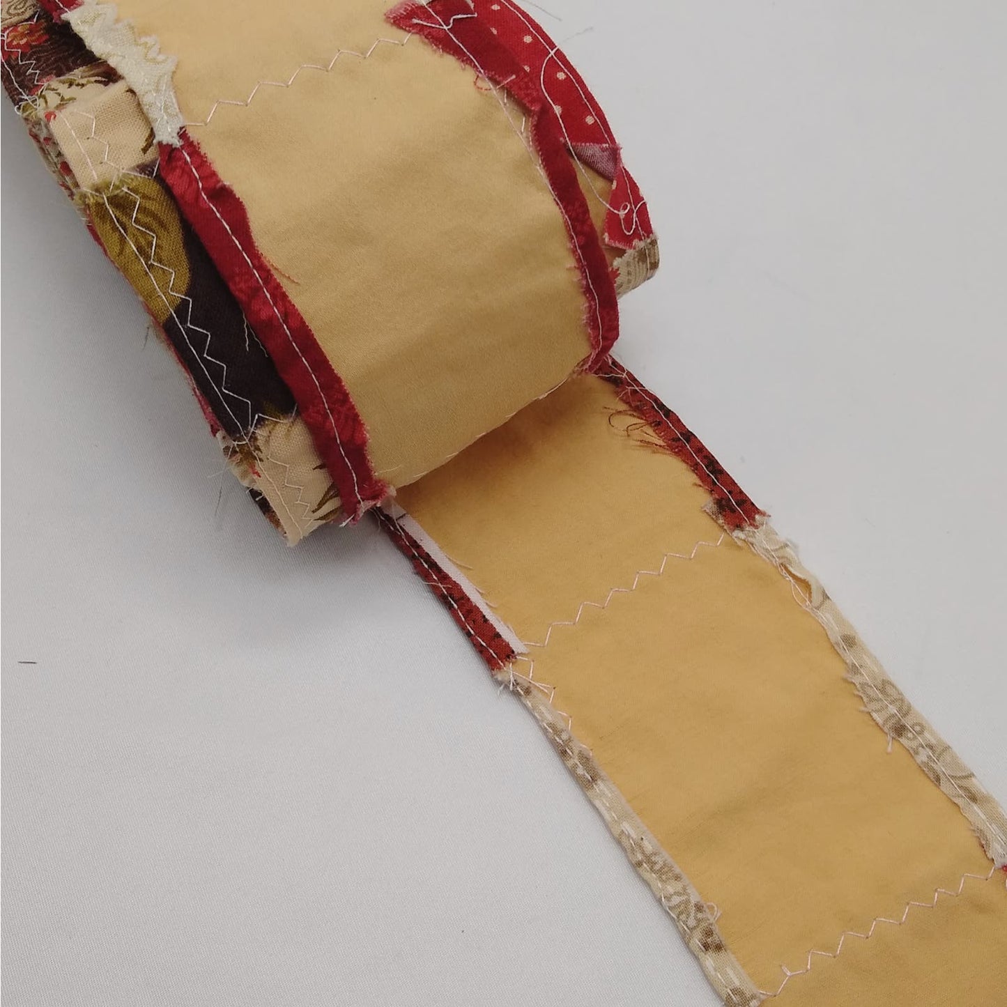 Fabric Snippet Roll, Red and Brown Sewn Fabric Roll, Sewn Snippet Roll
